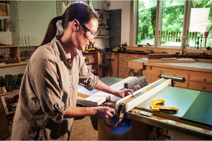 woman and table saw