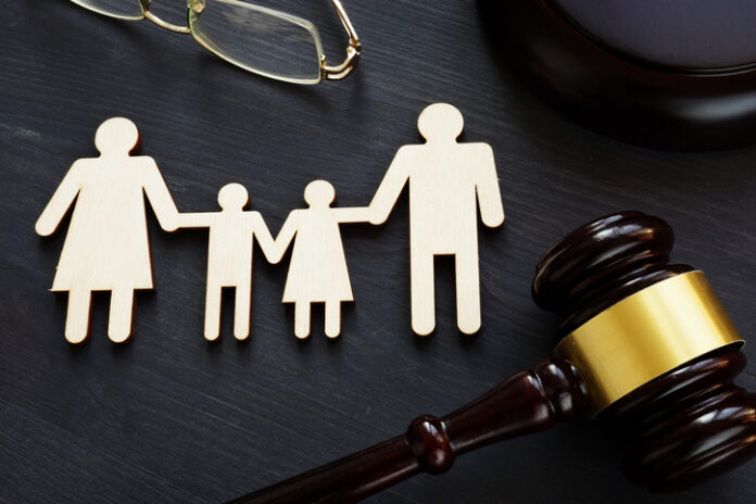 Family law concept. Figures and gavel. Divorce.